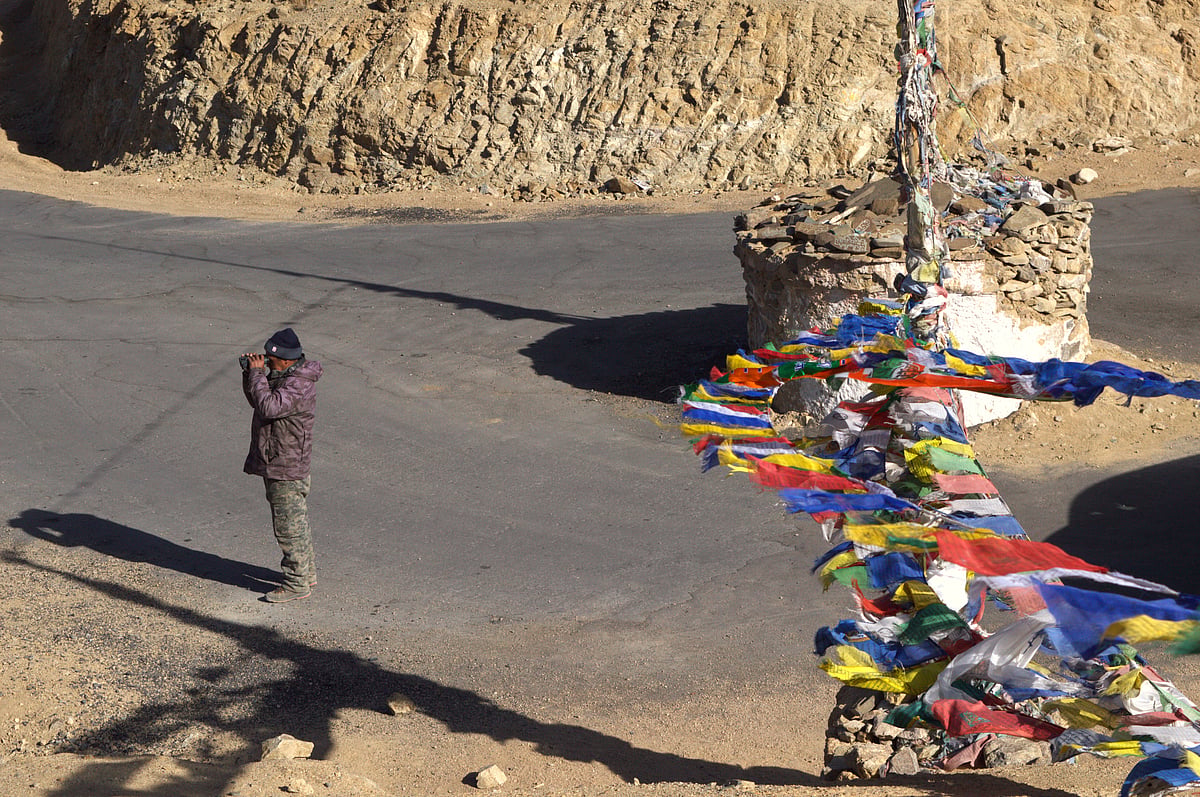 Norbu scanning the mountains
