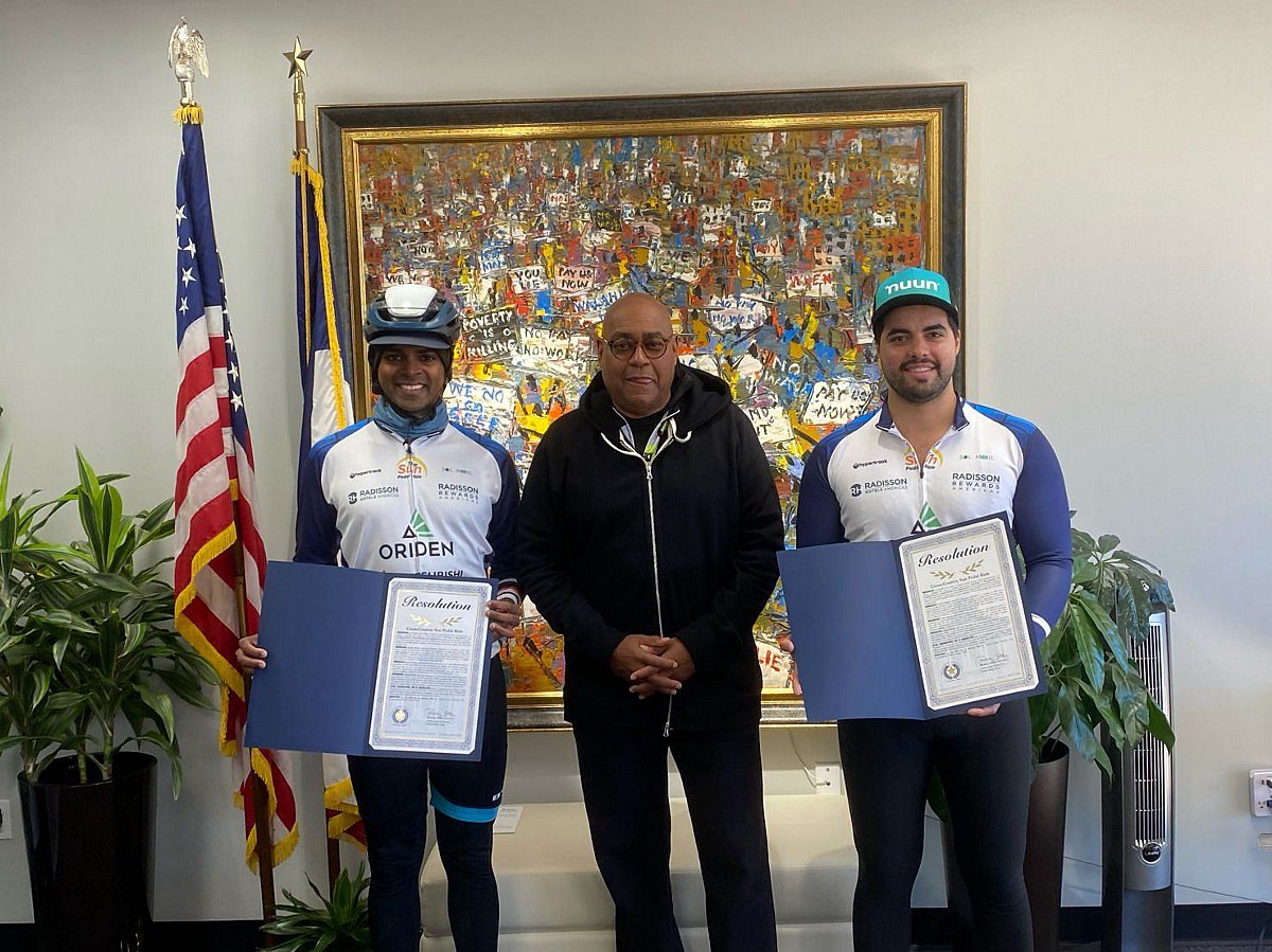 Sushil Reddy (on the left) posing for a photo