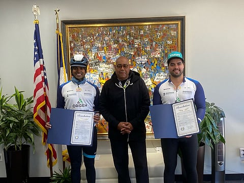 Sushil Reddy (on the left) posing for a photo