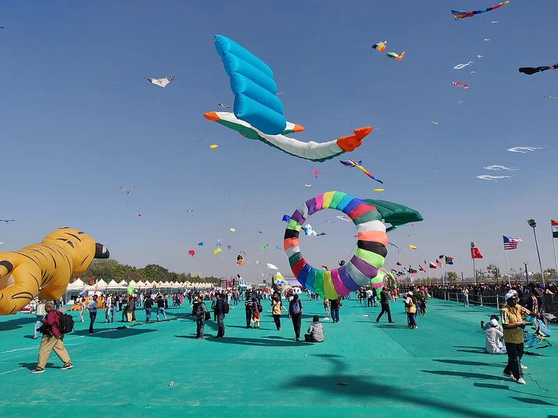 Colourful kites soaring up in the sky at the International Kite Festival in Ahmedabad