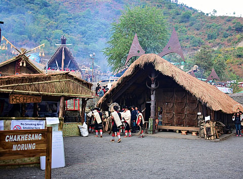 Chakhesang nagas gathered in front of their morung in Kisama Heritage Village 