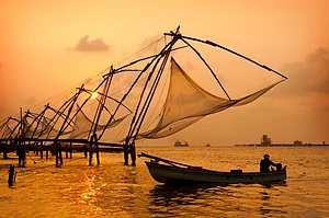 johnnychaos on Shutterstock : The Chinese fishing nets, locally called Cheenavala, were introduced to Kochi by the famed explorer Zheng He between 1350 and 1450 AD.