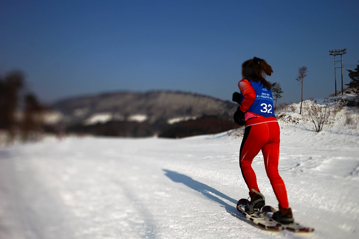 A participant in the snowshoe event