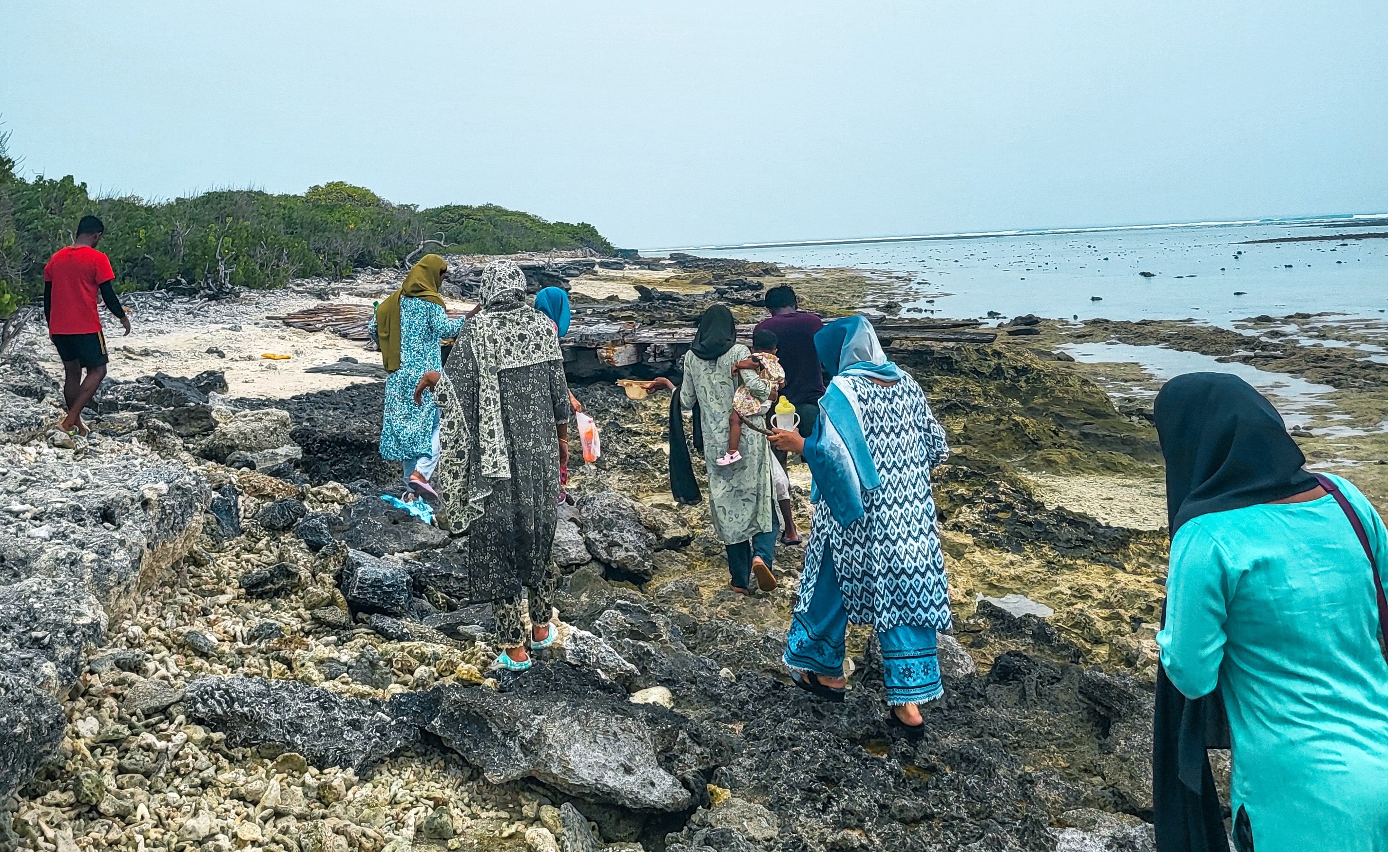 Tourists exploring Kalpitty Island in Lakshadweep
