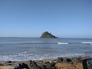 Tilmati beach in Karwar is a short but serene stretch of black sand