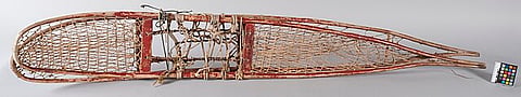 Traditionally crafted Athabascan hunting-style snowshoe using local birch for the frames