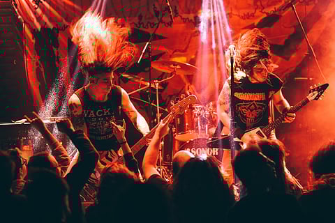 A metal band plays