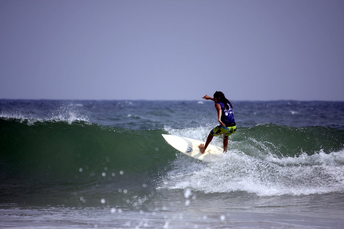 Surfing at Kovalam beach