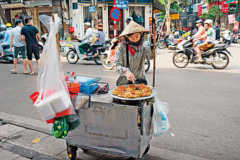 A street food vendor in Hanoi’s old quarter