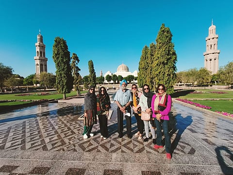 Our group posing in front of the Grand Mosque, Muscat