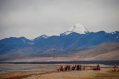 Almazoff/Shutterstock : The legendary sacred Mt Kailash seen from Lake Manasarovar