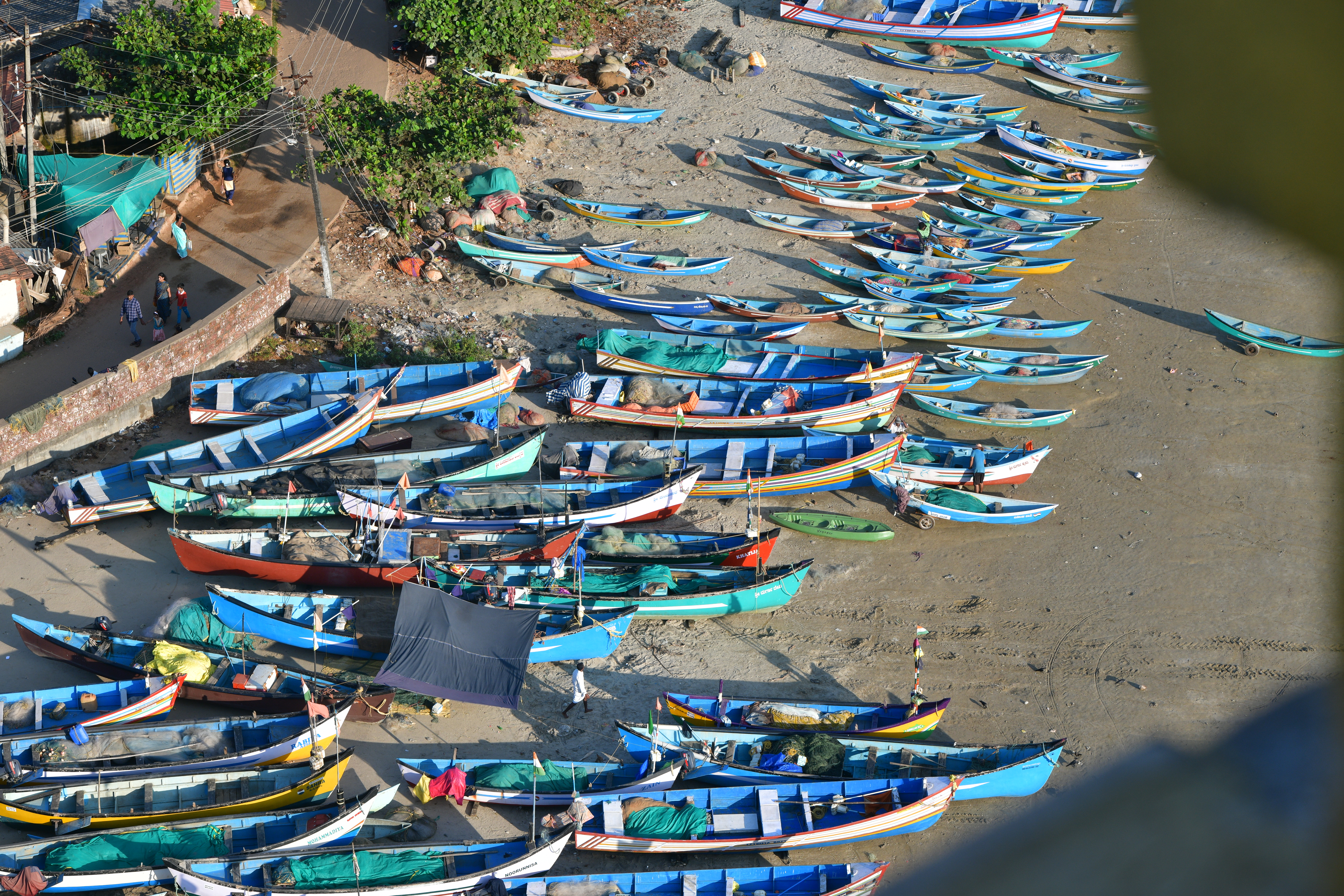 The shore housing the fishermen’s boats