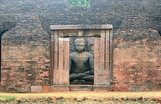 Rupesh Sarkar/ Wikimedia Commons : A Buddha sculpture at one of the monasteries in Lalitgiri 