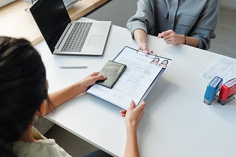 A woman applies for Schengen visa