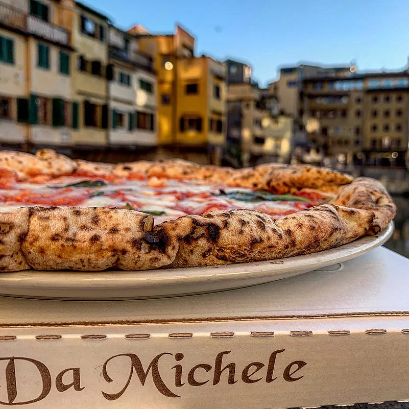 Visitors enjoy the peaceful setting as they enjoy what is arguably the best pizza place they have ever been to