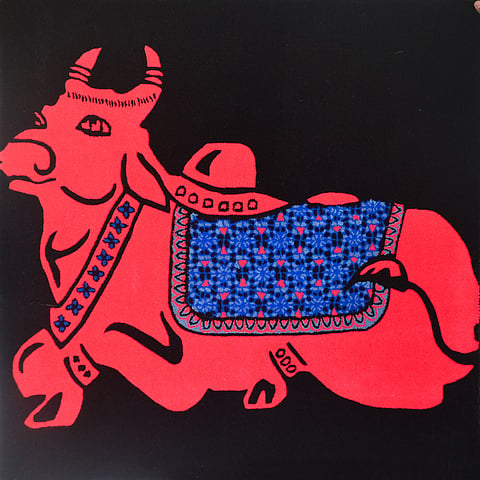 Nandi, by Jaipur Rugs, masterfully hand-tufted with neon-colored New Zealand wool, weaves the motifs of the Indian Constitution into contemporary design