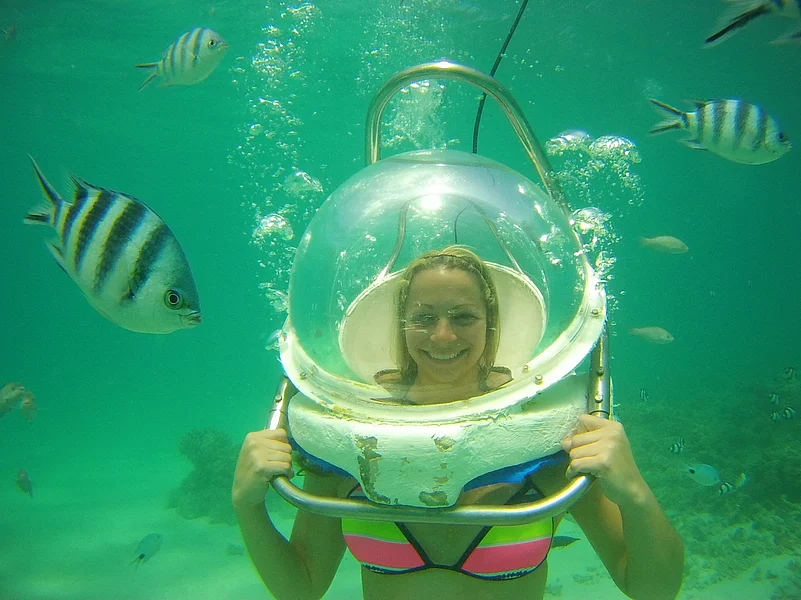 A participant in an undersea walk