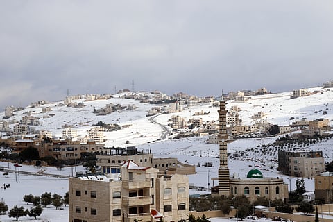 Amman, Jordan : A beautiful view of white lands due snow with the sun light 