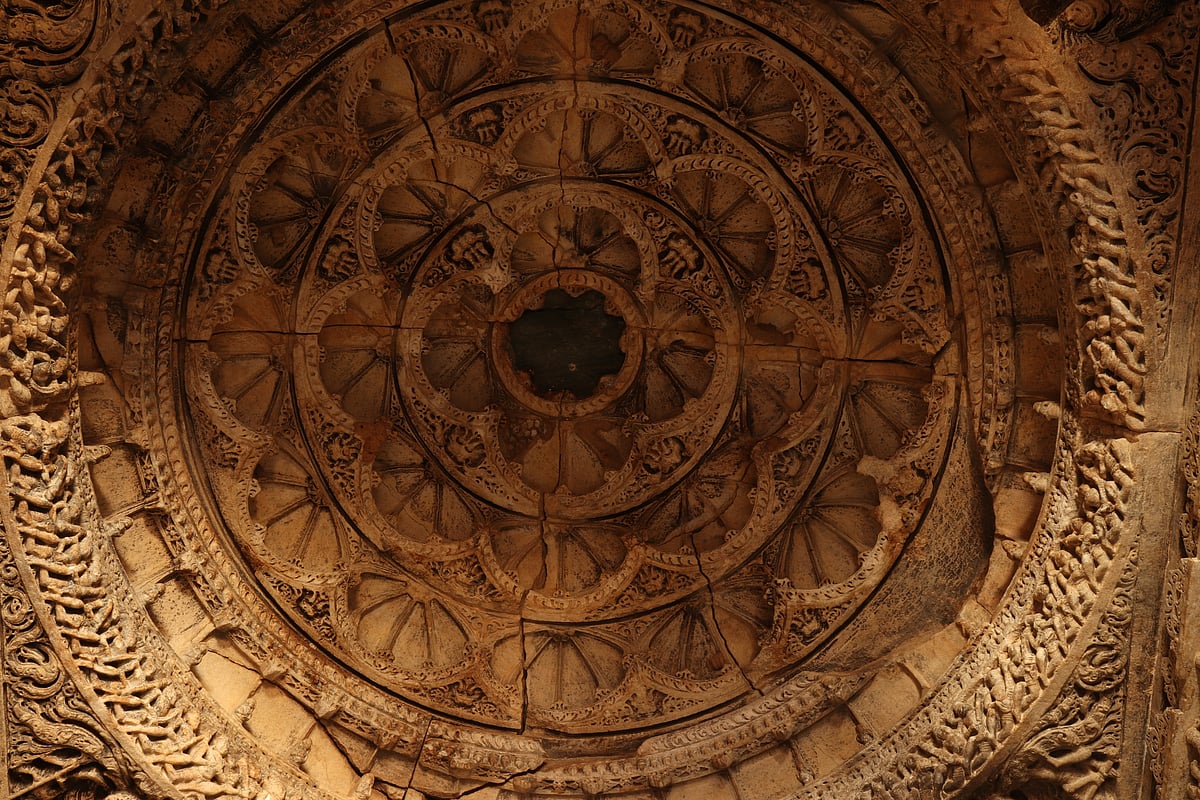 Decorative cusped arch in the centre.