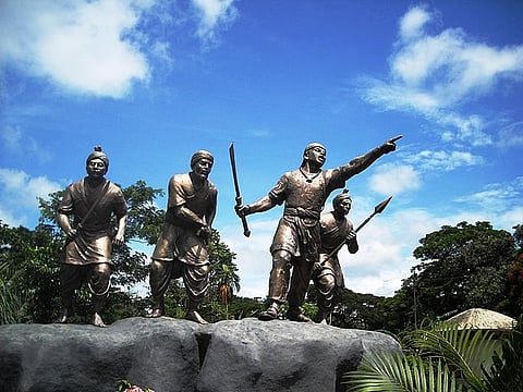 A statue of Ahom warriors in Sivasagar