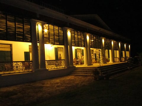 The lit up villa in the evening