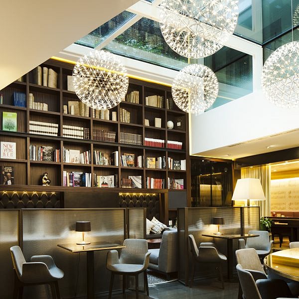  The towering bookshelves and glass ceiling make it an ideal spot to relax and read a classic Italian book 