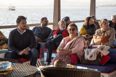 Q : Sushmita Singha (center) sits at the Udaipur Tales 2024 event
