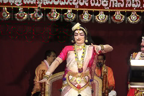 Yakshagana performances are characterised by intricate facial makeup, vibrant attire, and vigorous dance movements