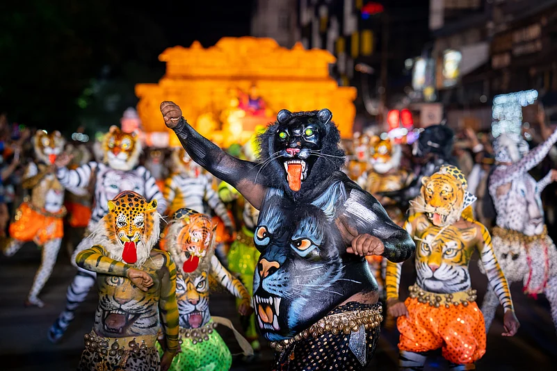 Puli Kali is a spectacular show of Onam where the artists wear masks, fake teeth, tongues, beards and mustaches