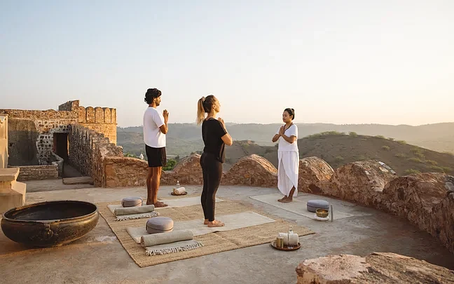 Sunrise yoga on fort ramparts