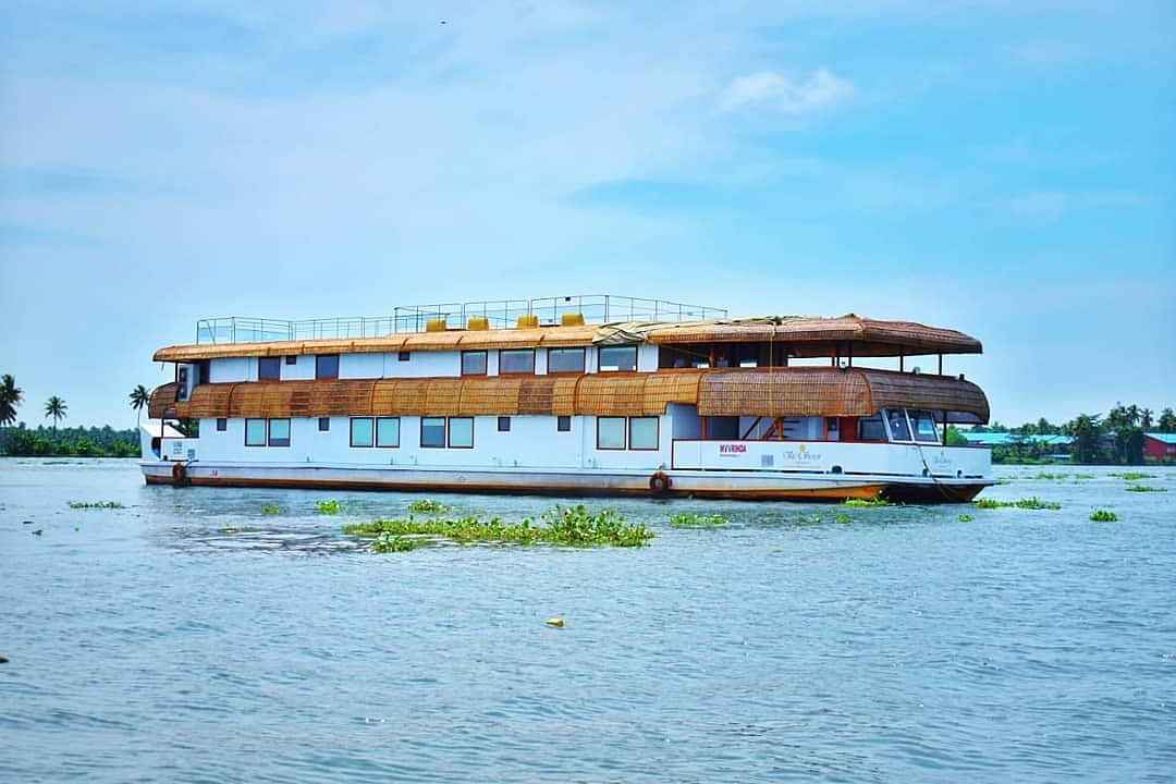 The houseboat allows you a serene backwater living experience in Kerala