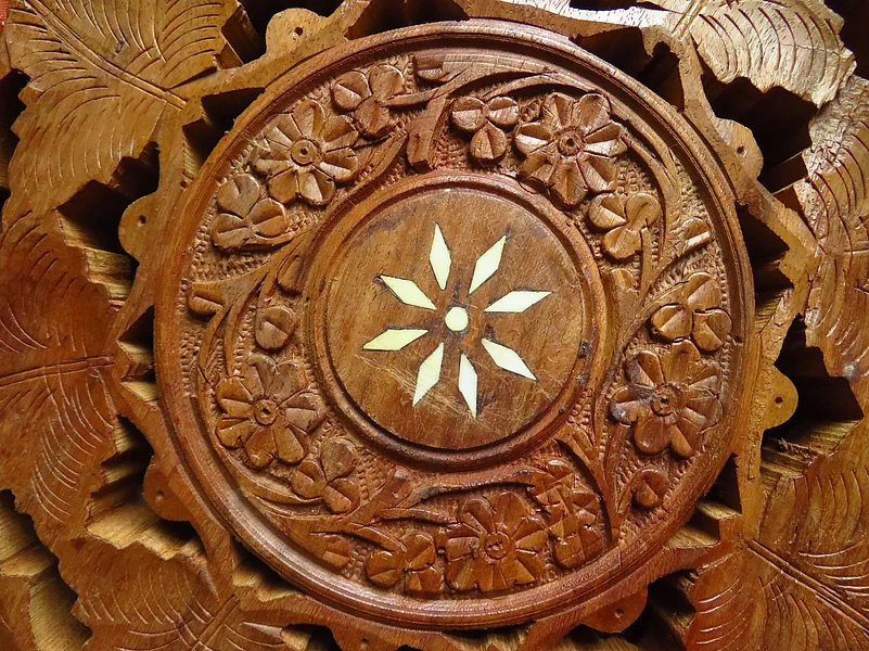 Wood carving with inlays