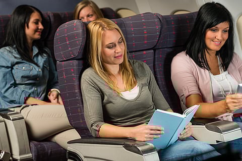 Reading a book or a magazine can stimulate your imagination and distract you from the anxiety of being on a plane