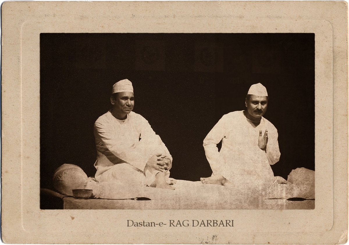 Two Dastangos narrating a tale from late sixties award winning dystopian novel Raag Darbari written by Shri Lal Shukla
