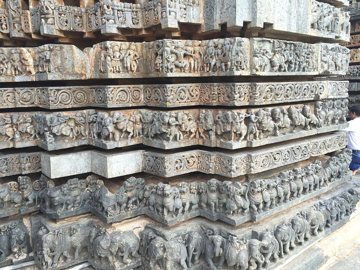 The Belur and Halebid temples are cut from a soft stone, chloritic schist. It allowed for very fine detailing
