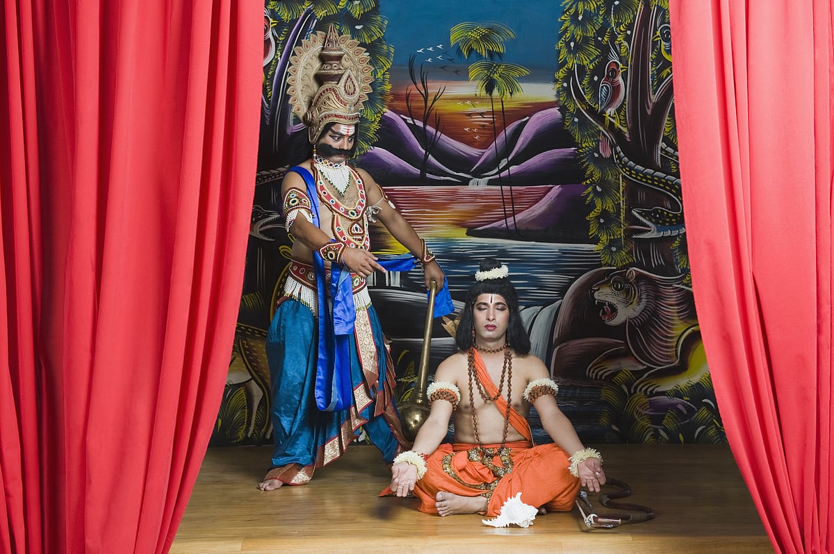 Two actors dressed-up as Rama and Ravana the Hindu mythological characters