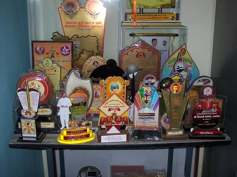 Trophies awarded to residents of Hiware Bazar