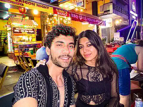 Muskaan and Aashish at a bar in Ho Chi Minh City, Vietnam