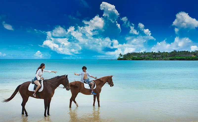 Enjoy a horseback ride along the secluded Riambel Beach