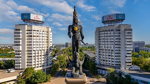 Aerial view of the bronze sculpture of the Golden Man on top of the Independence Monument