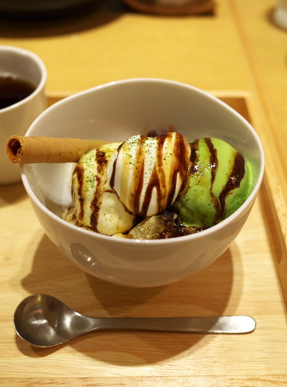 Matcha ice cream with chocolate sauce