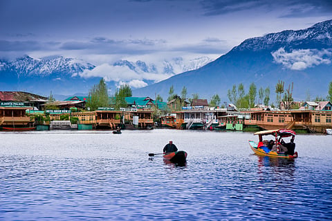 The Himalayas behind the Dal Lake in Srinagar
