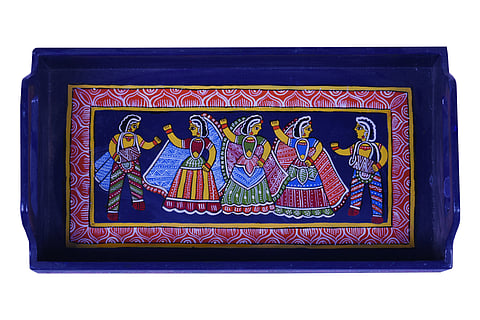 Tikuli on a serving tray