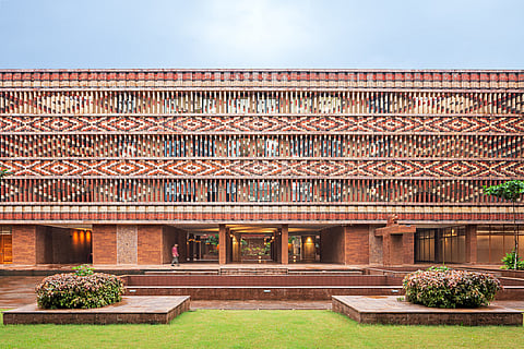 The brick-louvred screen of Krushi Bhawan, Odisha in the pattern of the famed Ikat weave