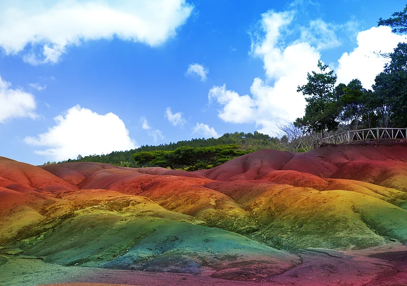 Thanks to volcanic activity, youll witness a dazzling display of red, brown, purple, green, blue, and yellow here
