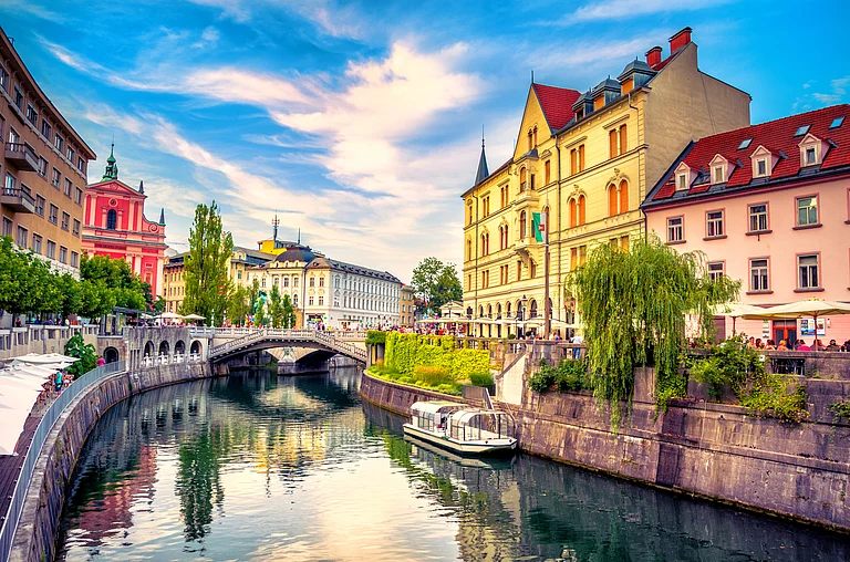 Cityscape view on Ljubljanica River canal in Ljubljana Old Town - Shutterstock
