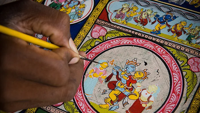 An artisan at the Raghurajpur Artist Village