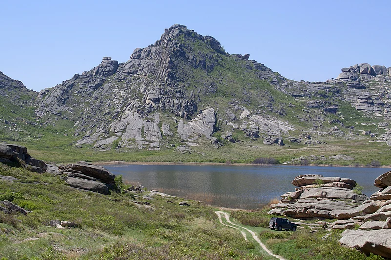 Granite rocks on the shore of the lake Saryarka