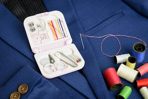 A travel sewing kit is a necessity if you're going to a destination wedding