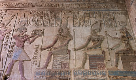 Hieroglypic carving paintings on wall at the ancient egyptian Temple of Opet in Karnak Luxor Egypt